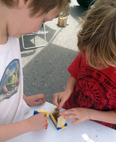 ethanTeachingGrowingWithLego